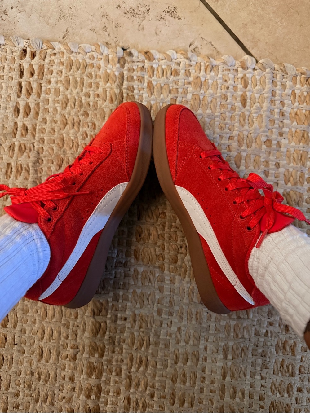 Elevate your outfit w/Puma Red Suede Sneakers with White Stripe and Gum Sole